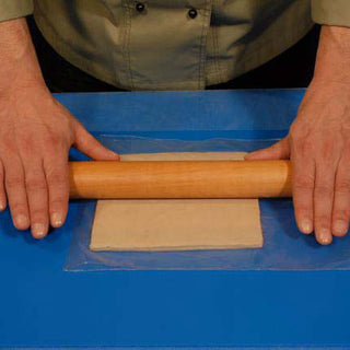 Sheeting Safe-D-Clay with a Rolling Pin