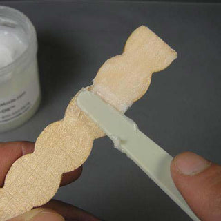 Mold-Dit Being Applied to the Under Side of an Original Object to be Molded.
