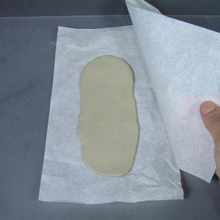 Safe-D-Clay Sheeted Between Two Sheets of Parchment Paper