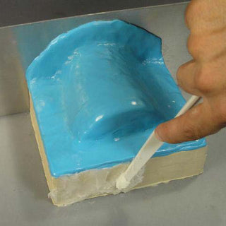 Mold-Dit Being Applied to Two Part Silicone Plastique Mold