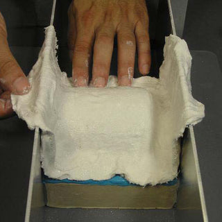 Plaster Cloth Being Used to Make Support Shell on Two Part Silicone Mold